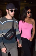 PRIYANKA CHOPRA and Nick Jonas Arrives at Airport in Mumbai 12/12/2018