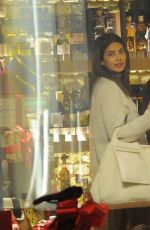 PRIYANKA CHOPRA and Nick Jonas Shopping at Hedonism Wine Warehouse in London 12/24/2018