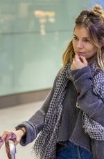 SIENNA MILLER at Heathrow Airport in London 12/27/2018