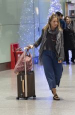 SIENNA MILLER at Heathrow Airport in London 12/27/2018