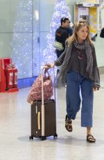 SIENNA MILLER at Heathrow Airport in London 12/27/2018