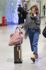 SIENNA MILLER at Heathrow Airport in London 12/27/2018
