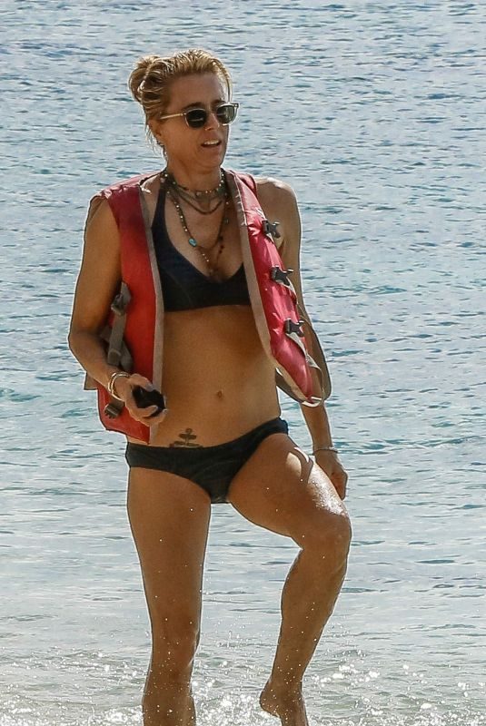 TEA LEONI in Bikini on Holiday in Barbados 12/27/2018
