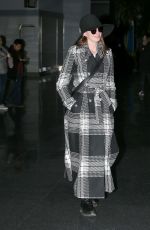 ANNE HATHAWAY Arives at JFK Airport in New York 01/21/2019