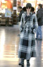 ANNE HATHAWAY Arives at JFK Airport in New York 01/21/2019