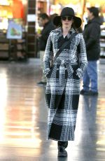 ANNE HATHAWAY Arives at JFK Airport in New York 01/21/2019