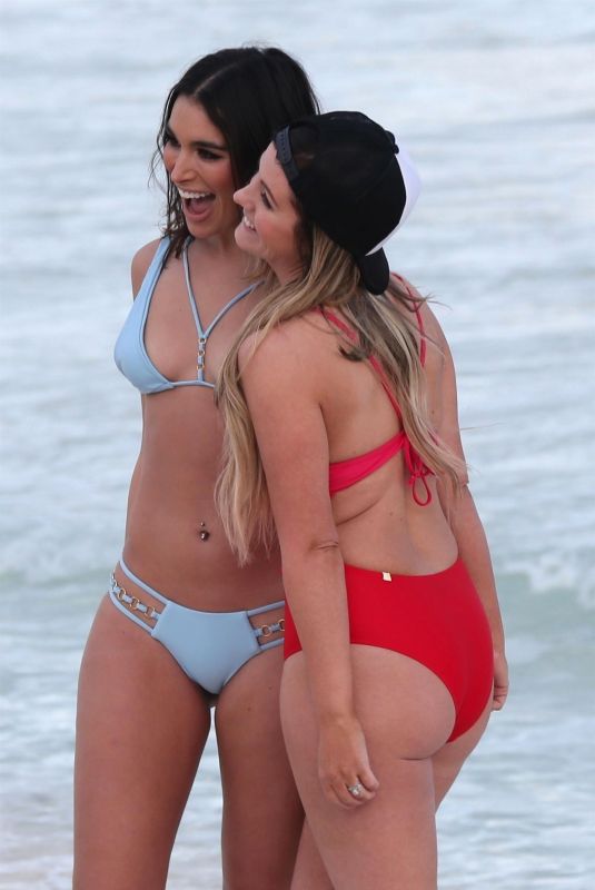 ASHLEY IACONETTI and CARLY WADELL in Swimwear at a Photoshoot on the Beach in Cancun 01/20/2019