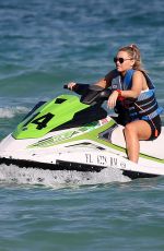 CAMILLE KOSTEK in Bikini Top Rides a Jetski in Miami 01/06/2019