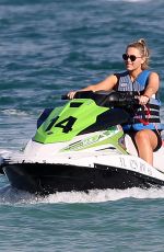 CAMILLE KOSTEK in Bikini Top Rides a Jetski in Miami 01/06/2019