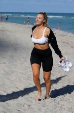 CAMILLE KOSTEK in Bikini Top Rides a Jetski in Miami 01/06/2019