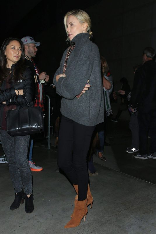 CHARLIZE THERON Arrives at LA Lakers Game at Staples Center in Los Angeles 01/09/2019