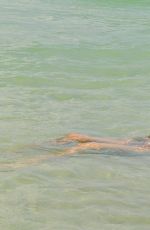 CHLOE GOODMAN in a Silver Swimsuit on the Beach in Barbados 01/12/2019