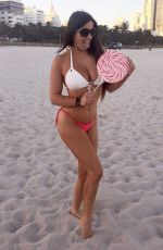 CLAUDIA ROMANI in Bikini at a Beach in Miami 01/08/2019