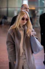 DAKOTA FANNING Arrive at CDG Airport in Paris 01/21/2019