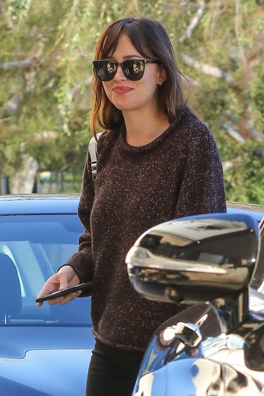 DAKOTA JOHNSON at Barneys New York in Beverly Hills 01/24/2019