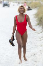 ELISA JOHNSON in Bikini at a Beach in Miami 01/01/2019