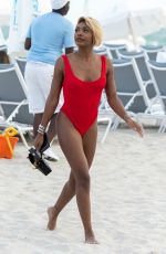 ELISA JOHNSON in Bikini at a Beach in Miami 01/01/2019
