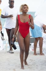 ELISA JOHNSON in Bikini at a Beach in Miami 01/01/2019