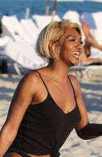 ELISA JOHNSON in Low Cut Baggy Jeans at a Beach in Miami 12/30/2018