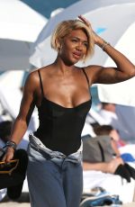 ELISA JOHNSON in Low Cut Baggy Jeans at a Beach in Miami 12/30/2018