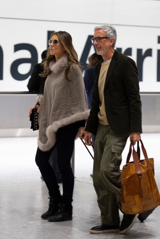 ELIZABETH HURLEY at Heathrow Airport in London 01/05/2019