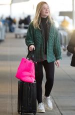 ELLE FANNING at JFK Airport in New York 01/07/2019