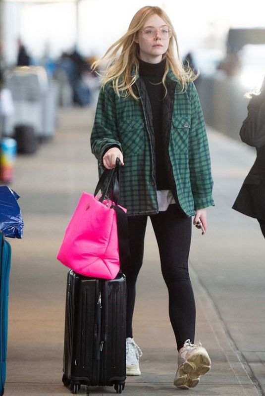 ELLE FANNING at JFK Airport in New York 01/07/2019