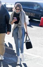 GIGI HADID Arrives at Airport in Milan 01/14/2019