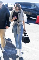 GIGI HADID Arrives at Airport in Milan 01/14/2019