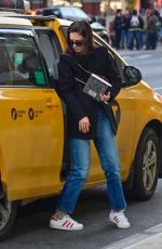 KATIE HOLMES Leaves a Taxi in New York 01/14/2019