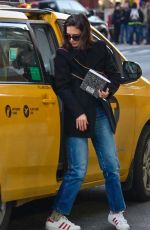 KATIE HOLMES Leaves a Taxi in New York 01/14/2019