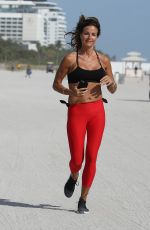 KELLY BENSIMON Out Jogging at a Beach in Miami 01/03/2019