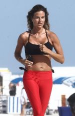 KELLY BENSIMON Out Jogging at a Beach in Miami 01/03/2019