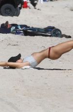 KIMBERLEY GARNER in Bikini Workout at a Beach in Miami 01/28/2019