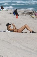 KIMBERLEY GARNER in Bikini Workout at a Beach in Miami 01/28/2019