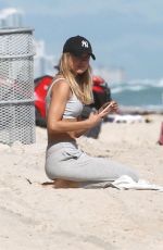KIMBERLEY GARNER in Bikini Workout at a Beach in Miami 01/28/2019