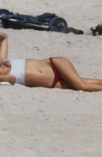 KIMBERLEY GARNER in Bikini Workout at a Beach in Miami 01/28/2019