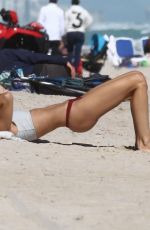 KIMBERLEY GARNER in Bikini Workout at a Beach in Miami 01/28/2019