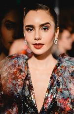 LILY COLLINS at Art of Elysium