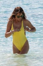 LIZZIE CUNDY in a Yellow Swimsuit on the Beach in Barbados 01/03/2019