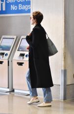 MAGGIE GYLLENHAAL at LAX Airport in Los Angeles 01/11/2019