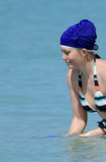 MEREDITH OSTROM in Bikini at a Beach in Barbados 01/15/2019
