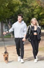 MICHELLE RANDOLPH mad Gregg Sulkin with Their Dog at a Park in Los Angeles 01/12/2019