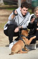 MICHELLE RANDOLPH mad Gregg Sulkin with Their Dog at a Park in Los Angeles 01/12/2019