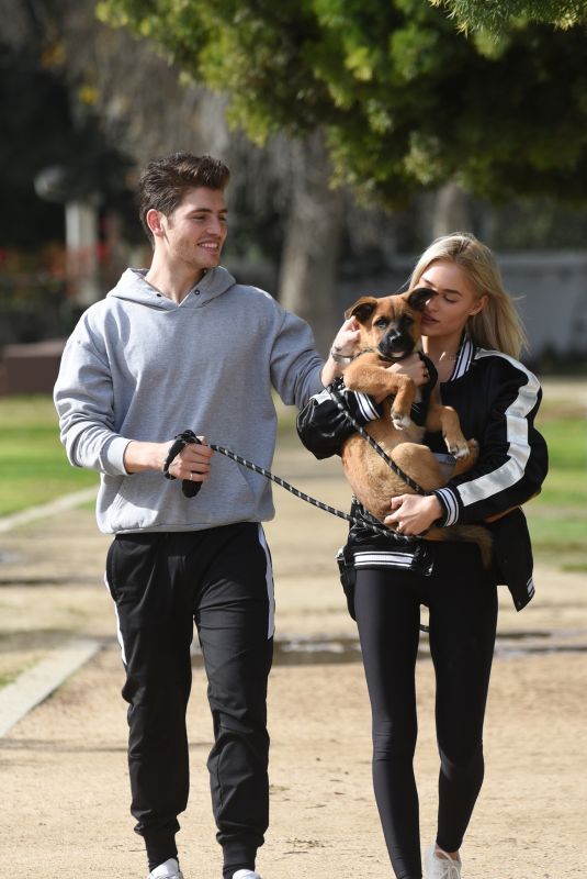 MICHELLE RANDOLPH mad Gregg Sulkin with Their Dog at a Park in Los Angeles 01/12/2019
