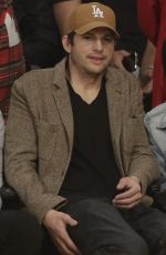 MILA KUNIS and Ashton Kutcher at LA Lakers vs Philadelphia 76