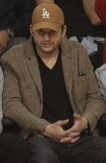 MILA KUNIS and Ashton Kutcher at LA Lakers vs Philadelphia 76
