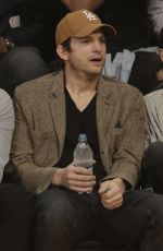 MILA KUNIS and Ashton Kutcher at LA Lakers vs Philadelphia 76