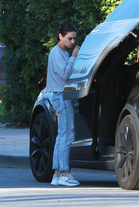 MILA KUNIS in a Mickey Mouse Sweater Out in Los Angeles 01/24/2019