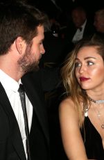 MILEY CYRUS and Liam Hemsworth at G